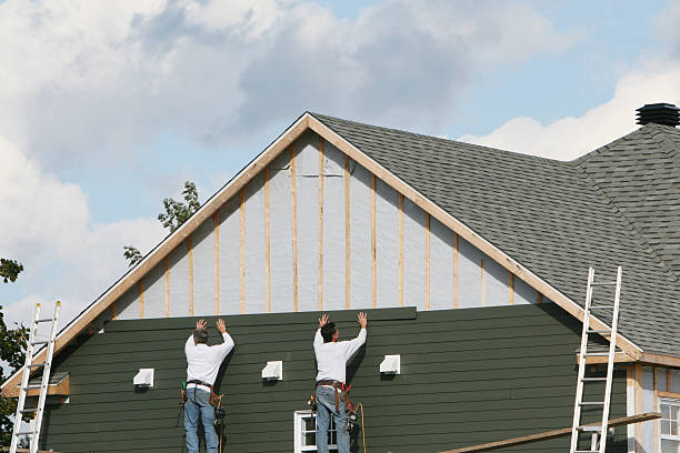 Professional Siding Installation technician working in Allston, MA